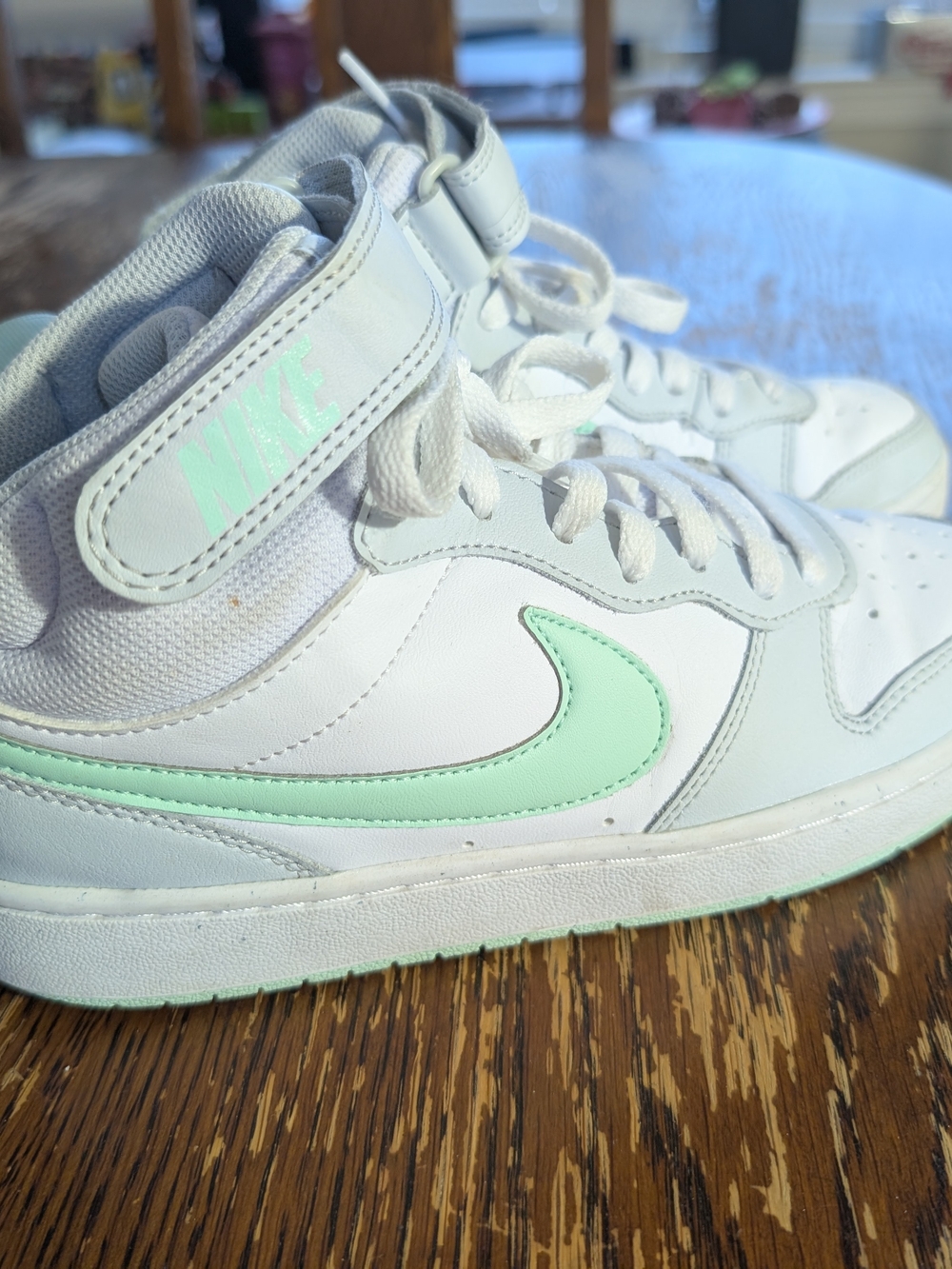 Nike Kids White High-Top Sneakers with Mint Green Swoosh
